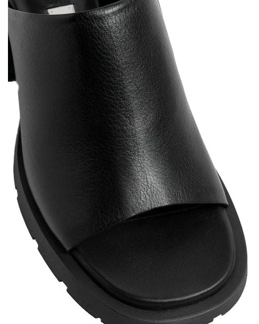 Miista Black Leather Lug-Sole Mules