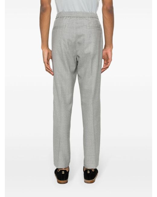 Pantaloni con pieghe di Brunello Cucinelli in Gray da Uomo
