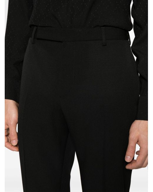 Pantaloni sartoriali a vita media di Saint Laurent in Black da Uomo
