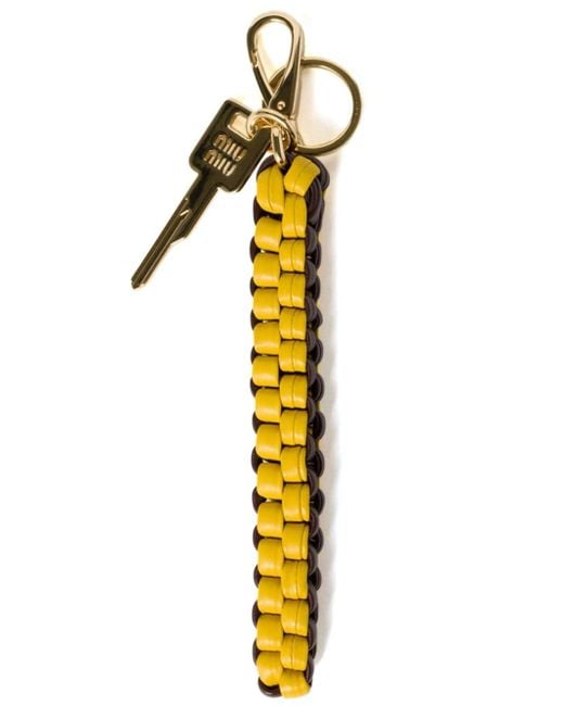【関税&送料込】Miu Miu Caramel Leather Keyring Miu Miu Leather Keychain in Metallic | Lyst