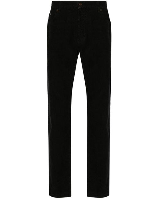 Pantaloni affusolati a coste di Saint Laurent in Black da Uomo