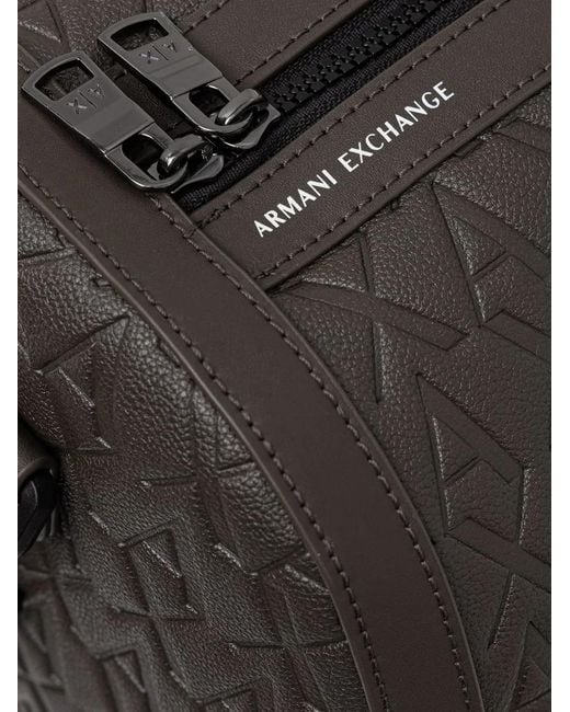 ARMANI EXCHANGE Black All-Over Logo-Embossed Holdall for men