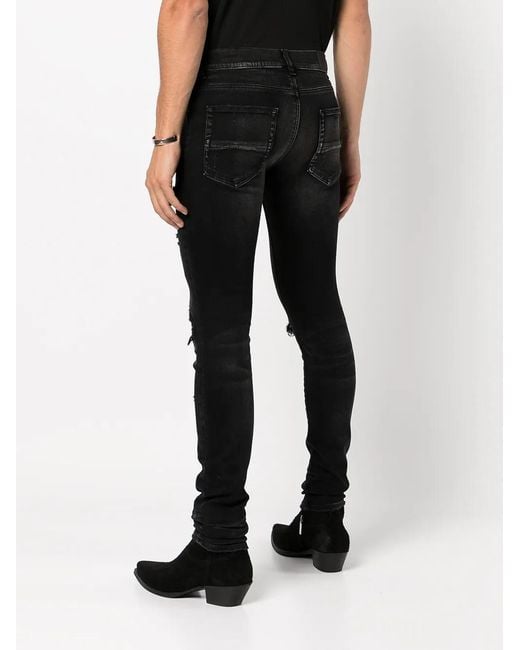 Amiri Black Distressed Skinny Jeans for men