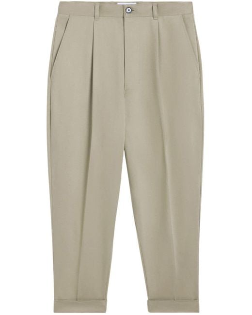 AMI Natural Pressed-crease Tapered Trousers for men