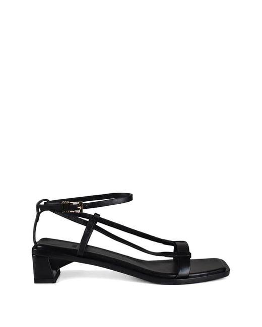 ANEST COLLECTIVE White Linea Sandals