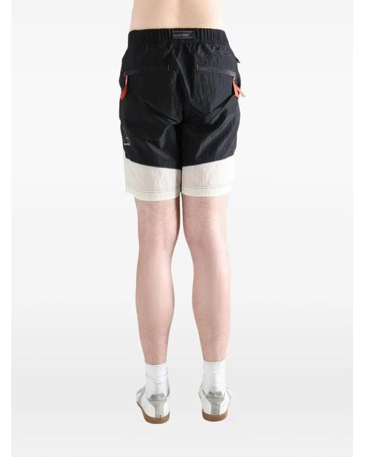 And Wander Black X Roa Panelled Belted Shorts for men