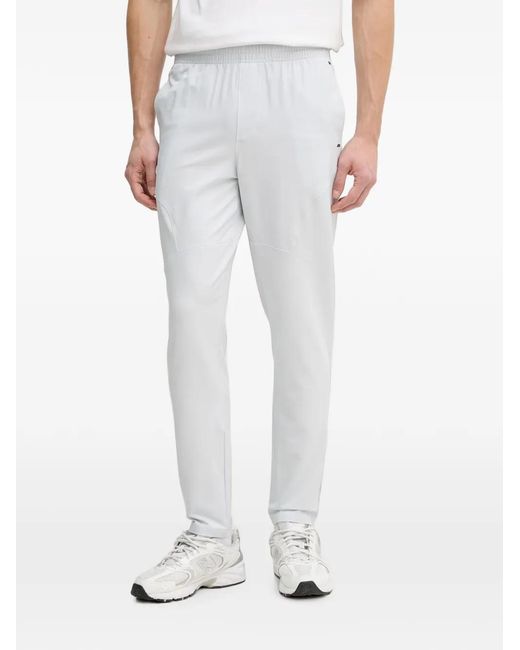 Under Armour White Ua Unstoppable Logo-Patch Elasticated-Waistband Trousers for men