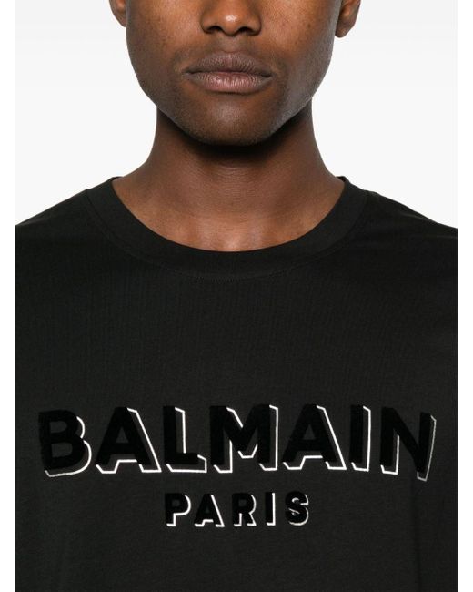 Balmain T-Shirt mit beflocktem Logo in Black für Herren