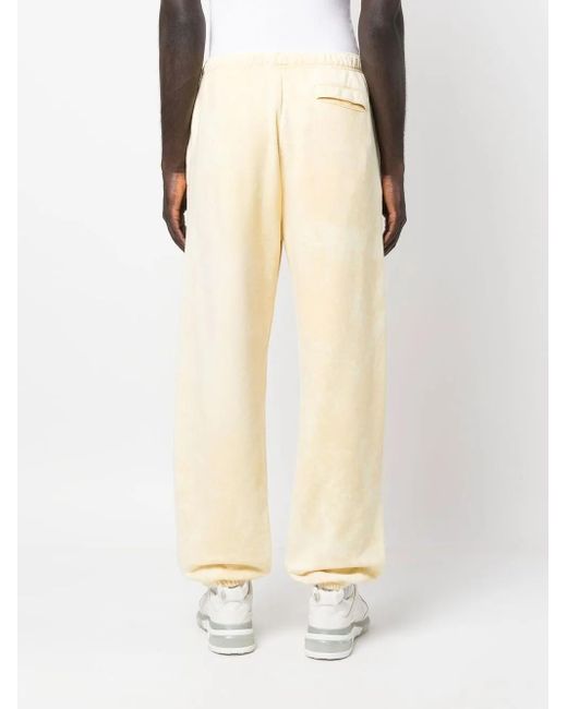 DIESEL Natural Embossed Logo Track Pants for men