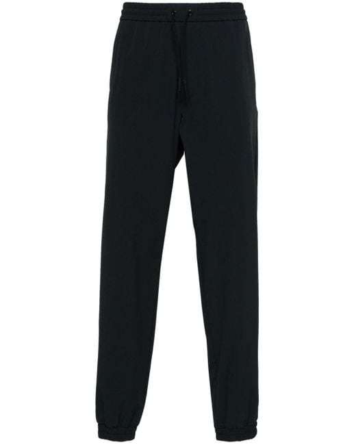 Moncler Black Rubberised-logo Elasticated-ankles Trousers for men