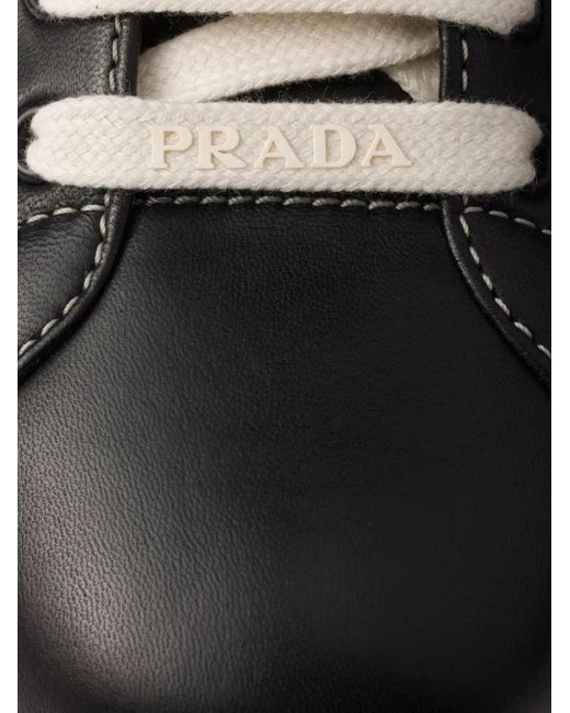 Baskets En Cuir À Logo Embossé Prada pour homme en coloris Black