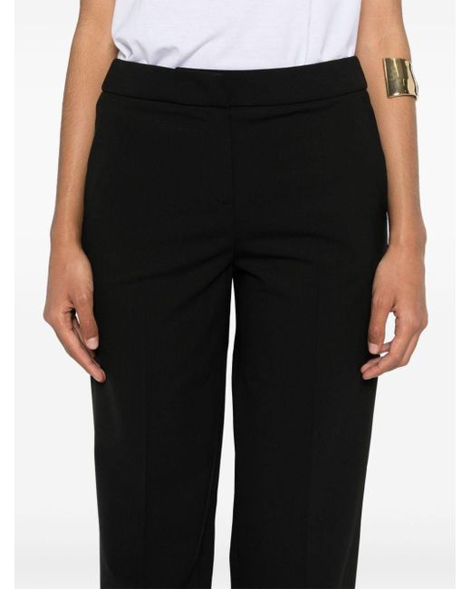 Pantalon droit à plis marqués Lardini en coloris Black