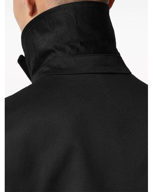 Gabardina con parche del logo Versace de hombre de color Black