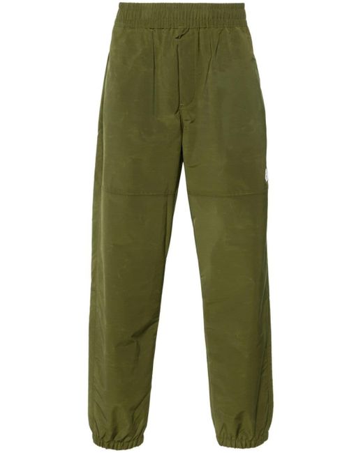 The North Face Green Easy Wind Tapered Trousers for men