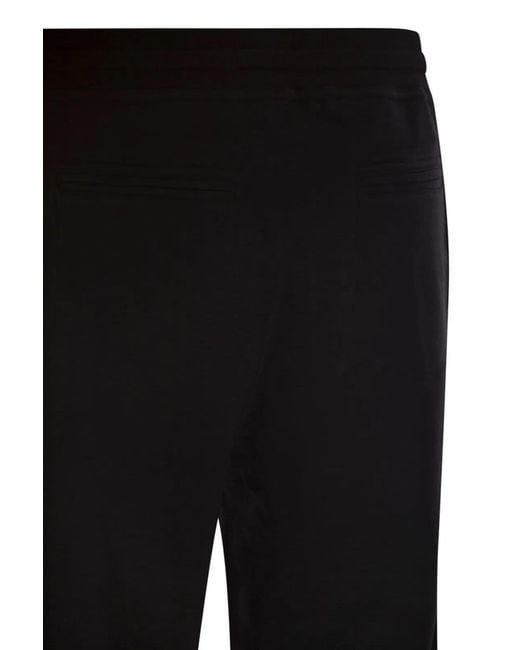 Brunello Cucinelli Black Techno Cotton Fleece Trousers for men