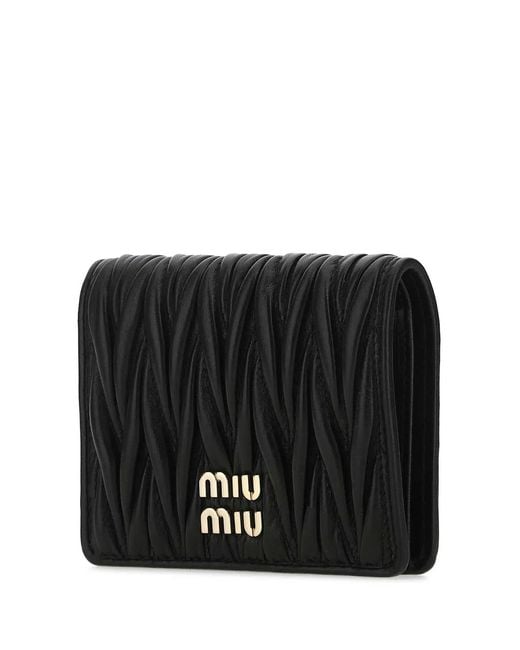 Miu Miu Black Small Matelassé Nappa Leather Wallet With Snap Closure