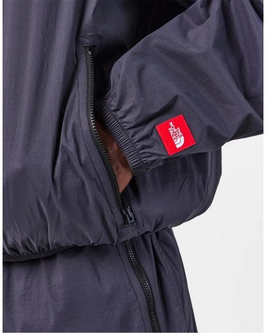 The North Face Blue Redbox Packable Windbreaker Jacket for men