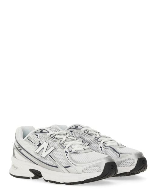 New Balance White Sneaker "U740"