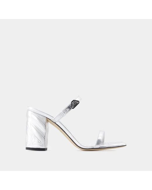 McQueen White Leather Seal Mules