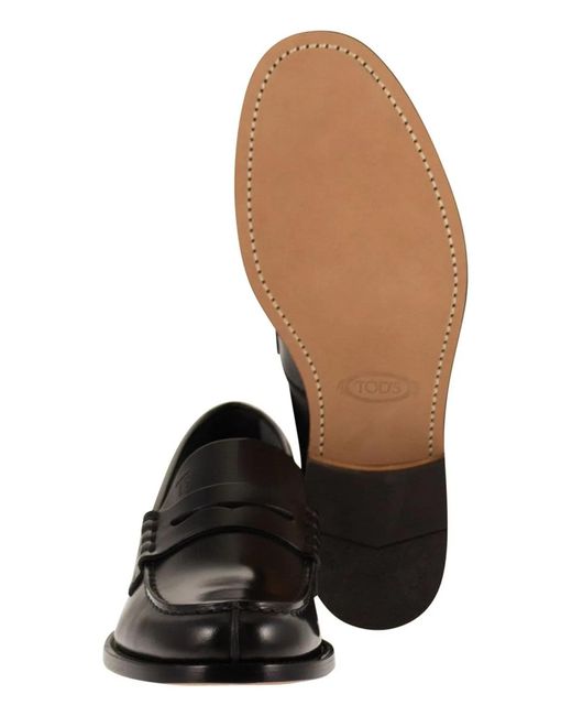 Tod's Black Leather Loafers for men