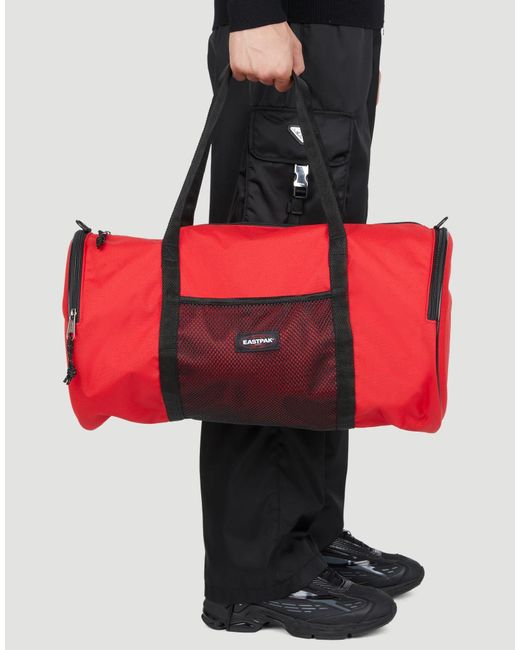 Eastpak Red X Telfar Large Duffel Logo Patch Duffle Bag for men