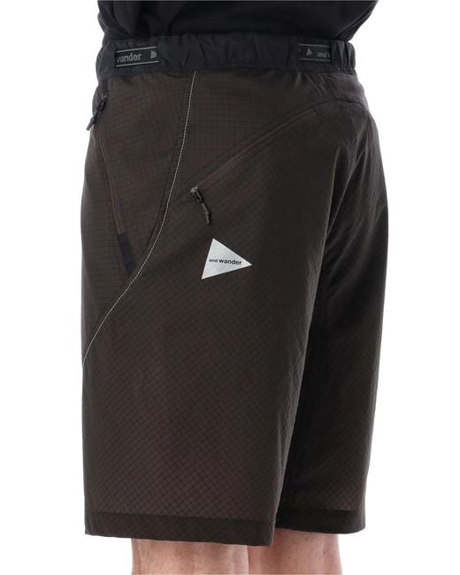 And Wander Black Breath Rip Short Pants for men