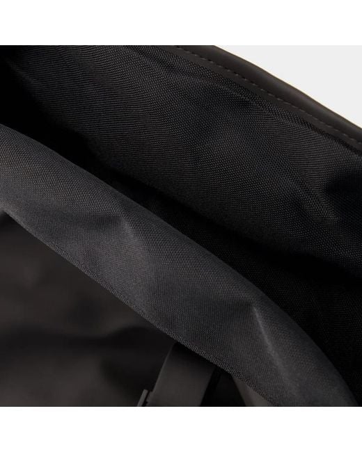 Rains Black Rolltop Rucksack Backpack