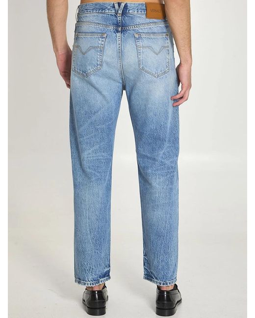 Versace Blue Stone-Wash Jeans With Studs for men