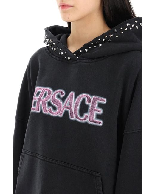 Versace Black Hoodie With Decorative Metal Studs And Vintage Effect