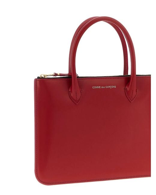 Comme des Garçons Red Wallet 'Handles