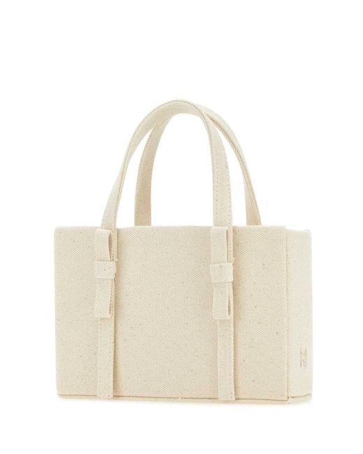 Kara White Ivory Canvas Handbag