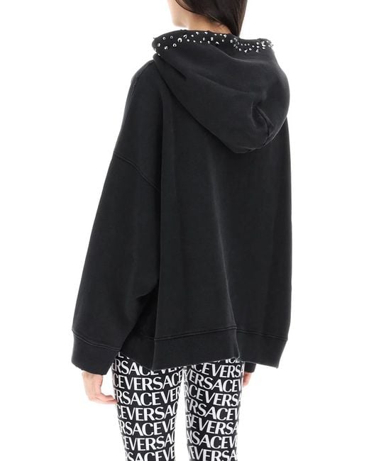 Versace Black Hoodie With Decorative Metal Studs And Vintage Effect