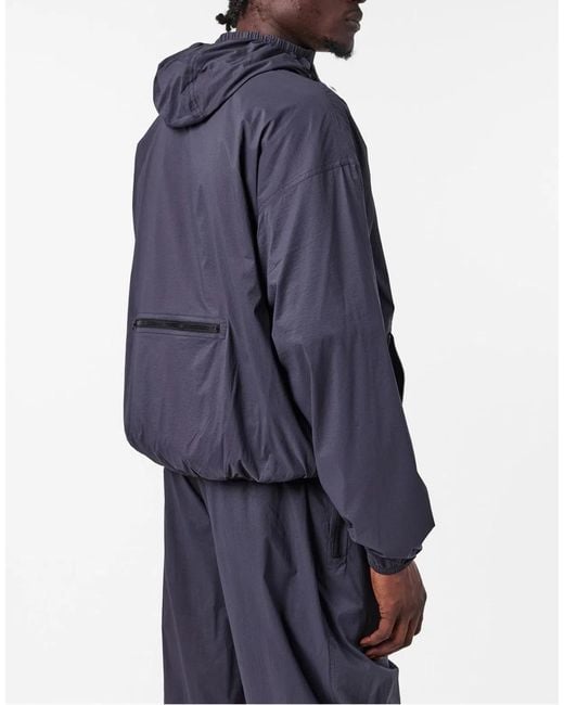 The North Face Blue Redbox Packable Windbreaker Jacket for men