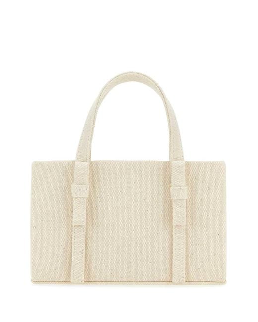 Kara White Ivory Canvas Handbag