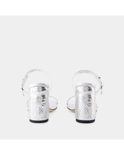 McQueen White Leather Seal Mules