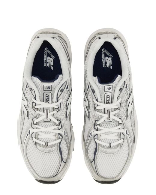 New Balance White Sneaker "U740"