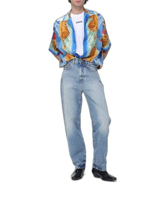 Versace Blue Washedeffect Jeans With Small Studs for men