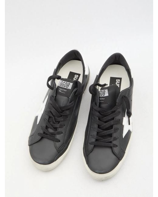 Golden Goose Deluxe Brand Black And Superstar Sneakers for men