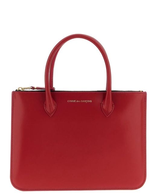 Comme des Garçons Red Wallet 'Handles
