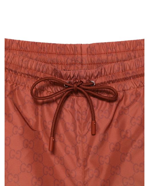 Gucci Red Swimsuit With Monogram Print for men