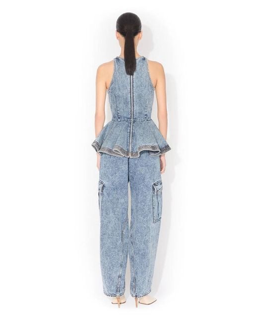 Alaïa Blue Alaia Peplum Denim Top With Ruffled Hem