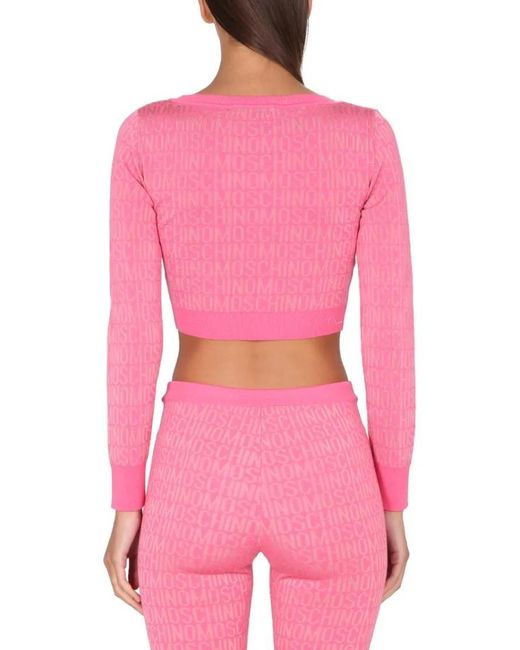 Moschino Pink Cropped Pullover With Allover Logo Pattern