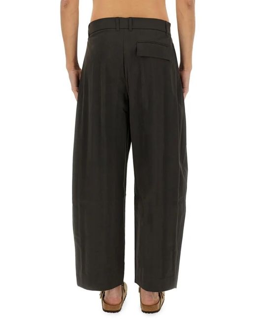 Studio Nicholson Wide-Leg Curved Pants With Pleated Front in Black für Herren
