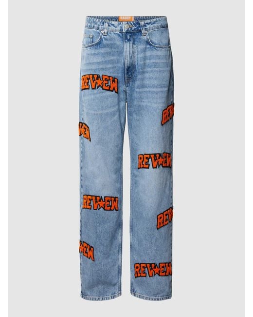 Review Blue Y2K Baggy Jeans mit auffälligen Logo Patches