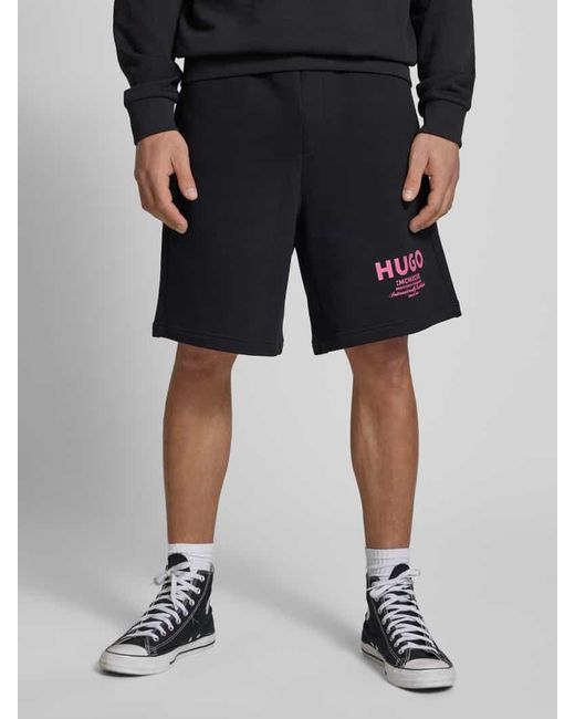 HUGO Baggy Fit Sweatshorts mit Label-Print Modell 'Nomario' in Black für Herren
