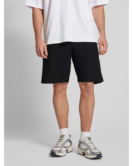 Review Regular Fit Sweatshorts mit Strukturmuster in Black für Herren