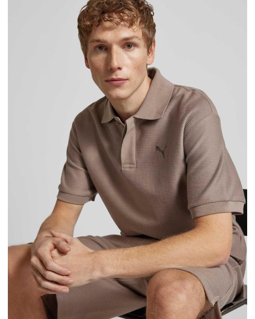 PUMA Relaxed Fit Poloshirt Met Labelstitching in het Natural voor heren