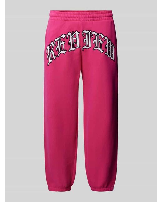 Review Regular Fit Sweatpants mit Label-Stitching in Pink für Herren