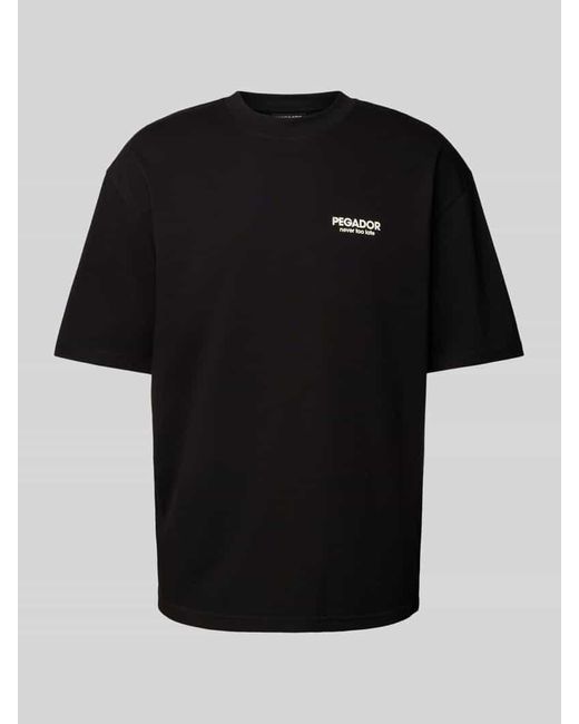PEGADOR Oversized T-Shirt mit Label- und Statement-Print Modell 'BALDOCK' in Black für Herren