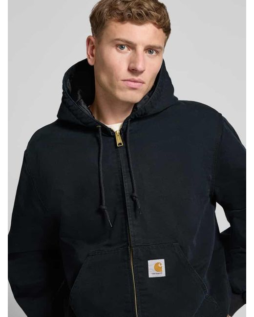 Carhartt Jacke mit Känguru-Tasche und Label-Detail in Black für Herren